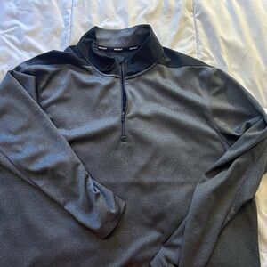 Golf quarter zips, one Nike one Travis Matthew